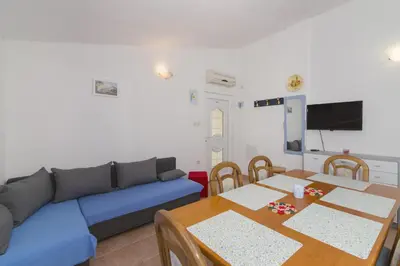 TV i/ili zabavni centar u objektu Apartments Besa