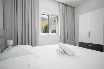 Krevet ili kreveti u jedinici u objektu Perla Luxury Apartment