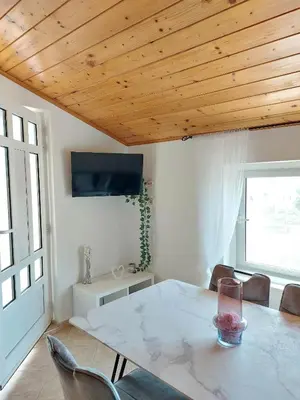 TV i/ili zabavni centar u objektu Apartmani Mare