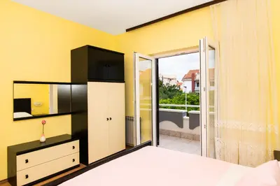Krevet ili kreveti u jedinici u objektu Apartments Krunoslava
