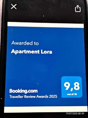 Certifikat, nagrada, logo ili neki drugi dokument izložen u objektu Lora