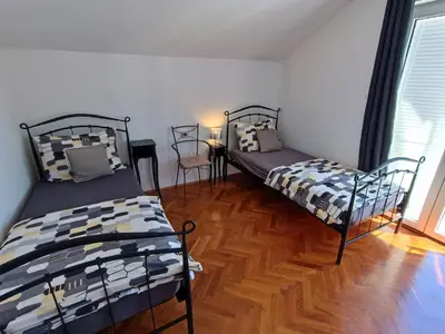 Krevet ili kreveti u jedinici u objektu Family apartment Kreso Vodice