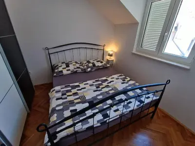 Krevet ili kreveti u jedinici u objektu Family apartment Kreso Vodice