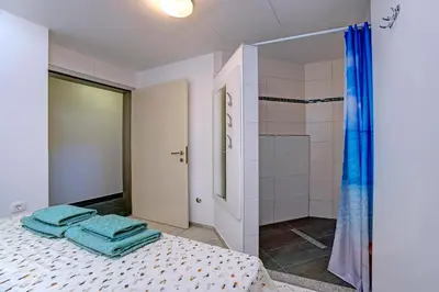 Krevet ili kreveti u jedinici u objektu Luxury Apartment Plavi Biser