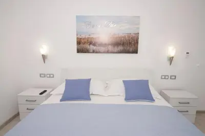 Krevet ili kreveti u jedinici u objektu Rozali Tisno Apartments