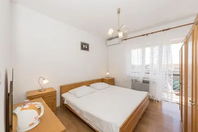 Krevet ili kreveti u jedinici u objektu Apartment Center and beach