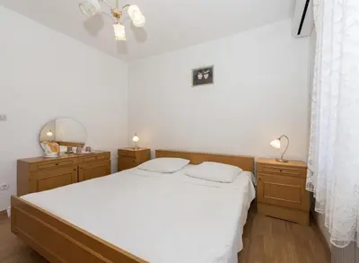 Krevet ili kreveti u jedinici u objektu Apartment Center and beach