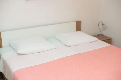 Krevet ili kreveti u jedinici u objektu Apartment Center and beach