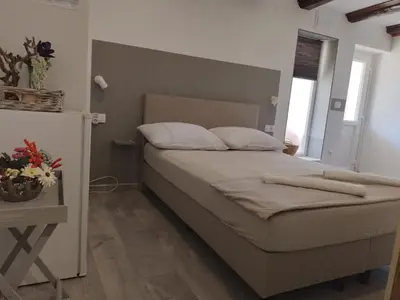 Krevet ili kreveti u jedinici u objektu Apartments Ciao Bella city centre with free parking