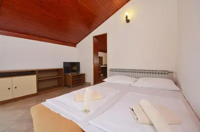 Krevet ili kreveti u jedinici u objektu Apartment and Rooms Mrkovic Top Lokacija i Parking