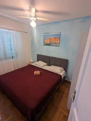 Krevet ili kreveti u jedinici u objektu ground floor apartment 50m from beach