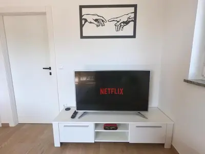 TV i/ili zabavni centar u objektu Apartment LIBERO
