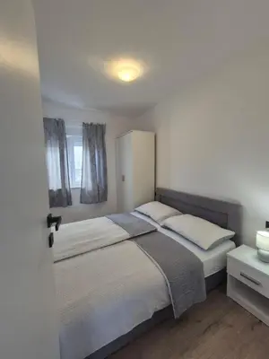 Krevet ili kreveti u jedinici u objektu Apartments Tonći