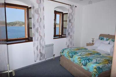 Krevet ili kreveti u jedinici u objektu Apartman Plava riba