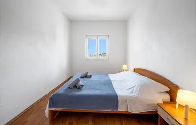 Krevet ili kreveti u jedinici u objektu Cozy Apartment In Murter With Kitchen