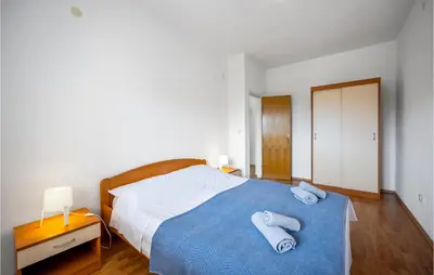 Krevet ili kreveti u jedinici u objektu Cozy Apartment In Murter With Kitchen