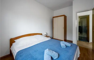 Krevet ili kreveti u jedinici u objektu Cozy Apartment In Murter With Kitchen
