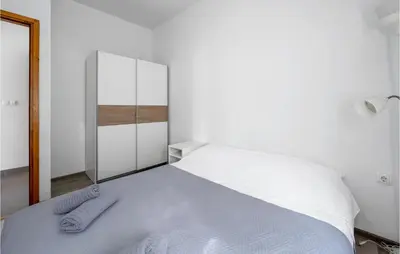 Krevet ili kreveti u jedinici u objektu Cozy Apartment In Murter With Kitchen