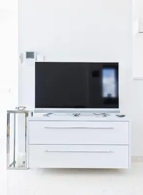 TV i/ili zabavni centar u objektu Villa Aliara Jacuzzi Apartment