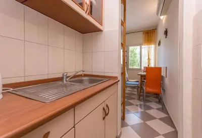 Kuhinja ili čajna kuhinja u objektu Neptun apartments
