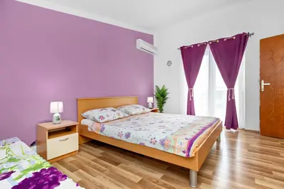 Krevet ili kreveti u jedinici u objektu Apartmani Alaga B