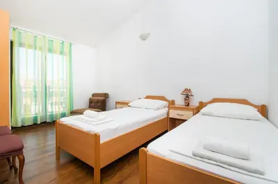Krevet ili kreveti u jedinici u objektu Apartments Ivan