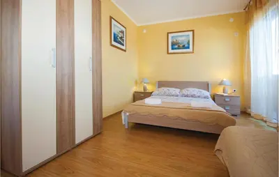 Krevet ili kreveti u jedinici u objektu Two-Bedroom Apartment In Zatoglav