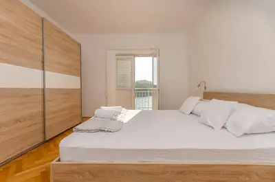 Krevet ili kreveti u jedinici u objektu Apartment Slobodan by the sea