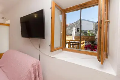 TV i/ili zabavni centar u objektu House Hidden Beauty