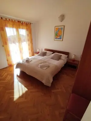 Krevet ili kreveti u jedinici u objektu Apartmani Ljubo