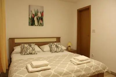 Krevet ili kreveti u jedinici u objektu Apartmani Ljubo