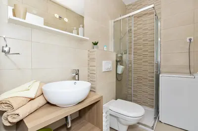 Kupaonica u objektu Family-friendly apartments with swimming pool Brodarica, Sibenik - 20248