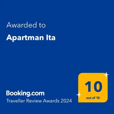 Certifikat, nagrada, logo ili neki drugi dokument izložen u objektu Apartman Ita