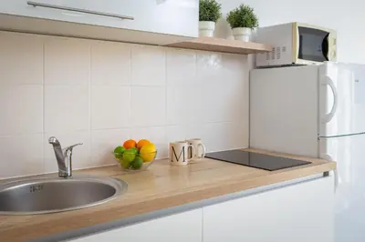 Kuhinja ili čajna kuhinja u objektu Apartments Tihi III