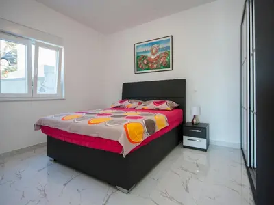 Krevet ili kreveti u jedinici u objektu Apartments Happy Holiday