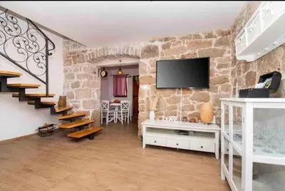 TV i/ili zabavni centar u objektu Luxury stone house Amfora