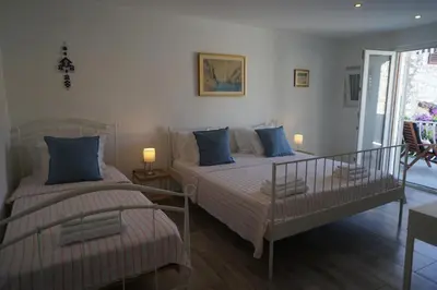 Krevet ili kreveti u jedinici u objektu A Cozy Home In the Heart of Old Murter, Croatia