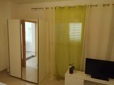 TV i/ili zabavni centar u objektu Apartmani Trubi 1