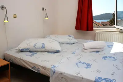 Krevet ili kreveti u jedinici u objektu Apartments & Rooms Villa Petra