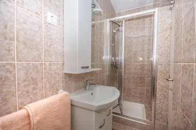 Kupaonica u objektu Apartments Cozy apartments