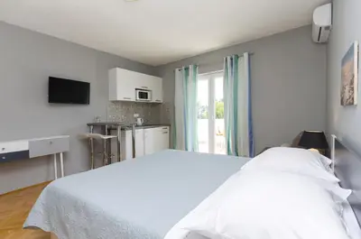 Krevet ili kreveti u jedinici u objektu Apartments Cozy apartments