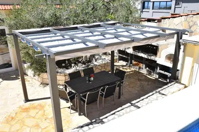Restoran ili neka druga zalogajnica u objektu Villa Luger 2 Dachgeschoss