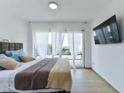 Krevet ili kreveti u jedinici u objektu Holiday Home Sunrise by Interhome