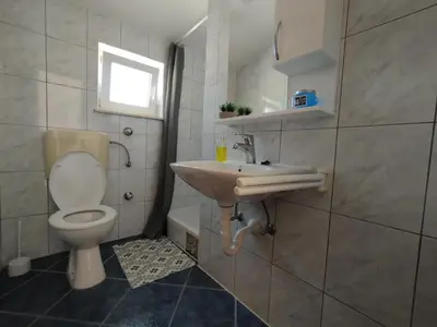 Kupaonica u objektu VILLA VENDULA, 60 metrů od moře