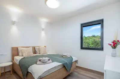 Krevet ili kreveti u jedinici u objektu Sun Resort Apartments