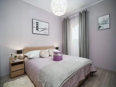 Krevet ili kreveti u jedinici u objektu Garden Boutique Apartments