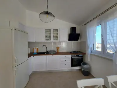 Kuhinja ili čajna kuhinja u objektu Apartman Laura 2