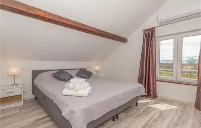 Krevet ili kreveti u jedinici u objektu Nice Home In Kaocine - Miljevci