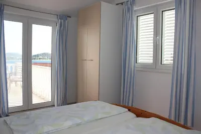 Krevet ili kreveti u jedinici u objektu Apartment in Rogoznica with sea view, balcony, air conditioning, WiFi 5148-4