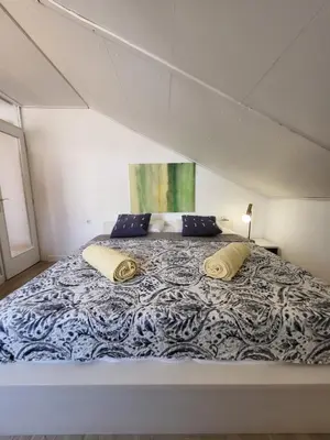Krevet ili kreveti u jedinici u objektu ApartmaniinPrimosten